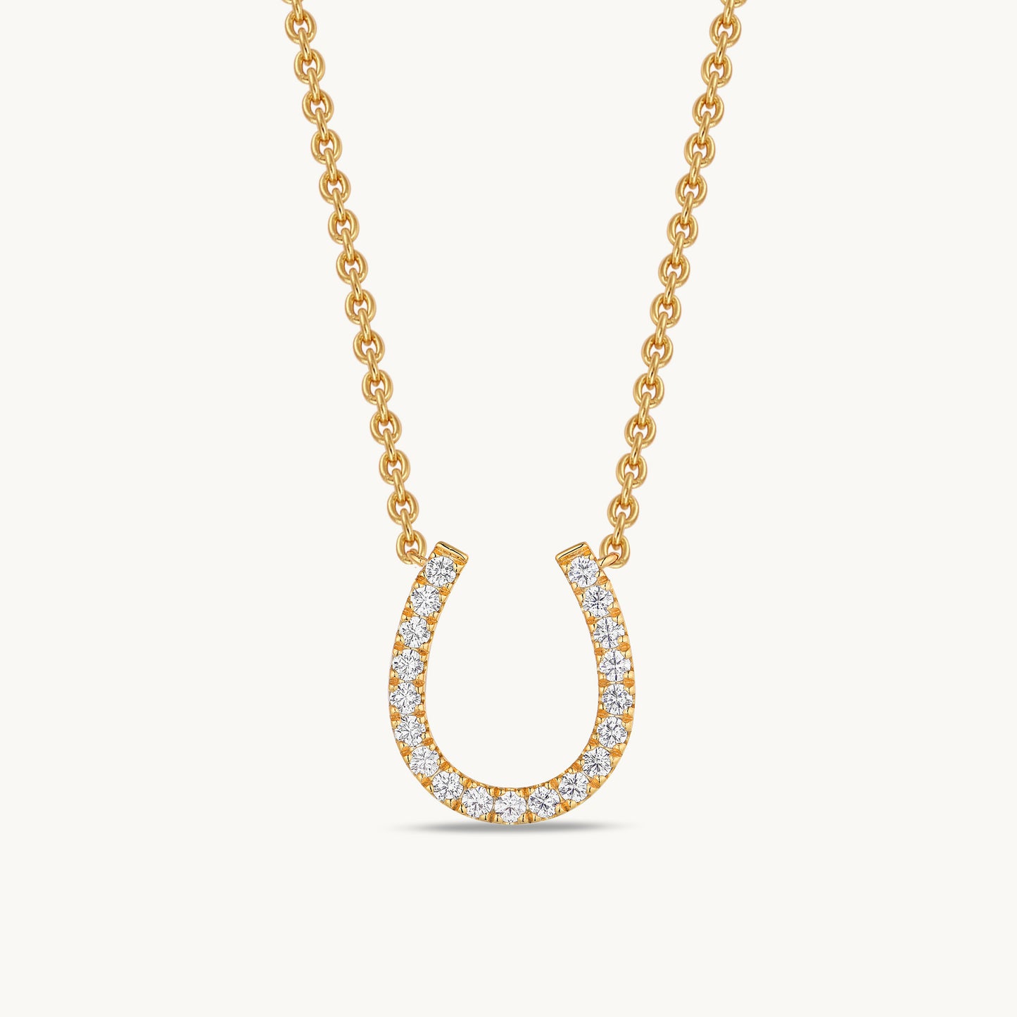gold horseshoe charm necklace