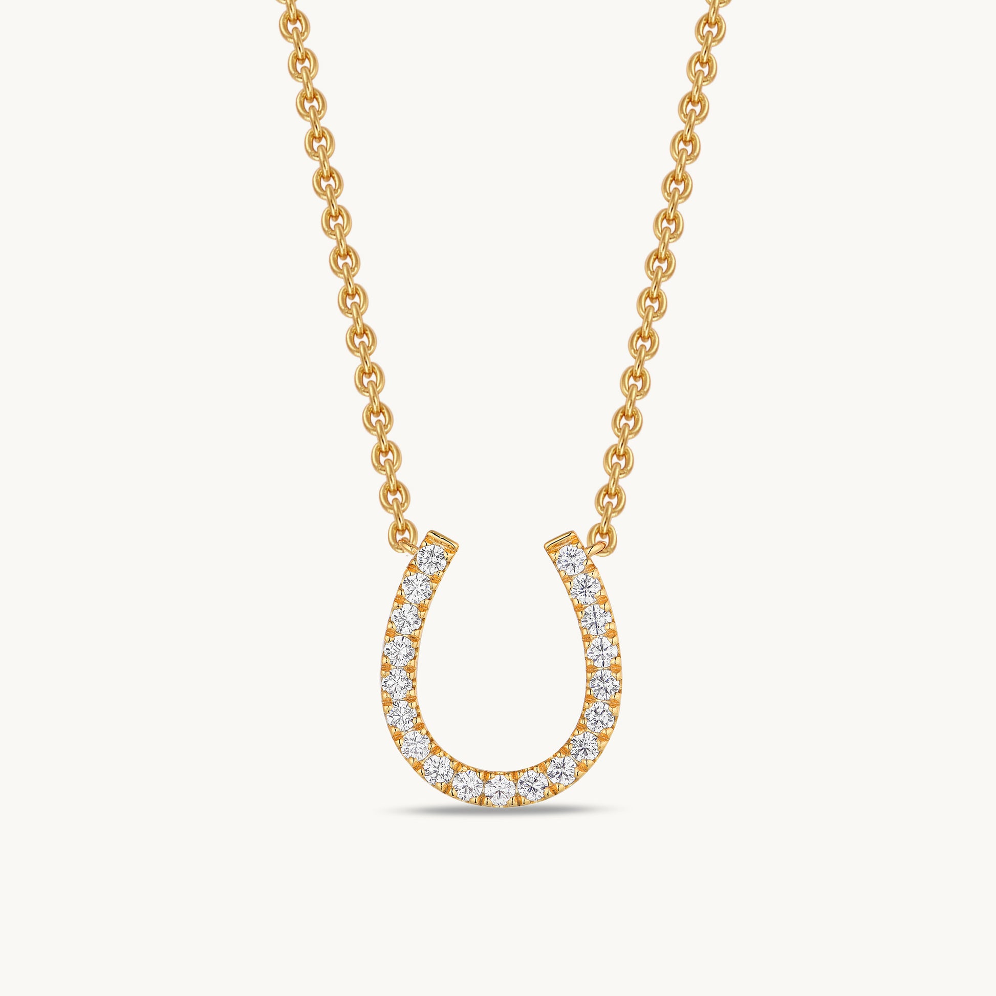 gold horseshoe charm necklace