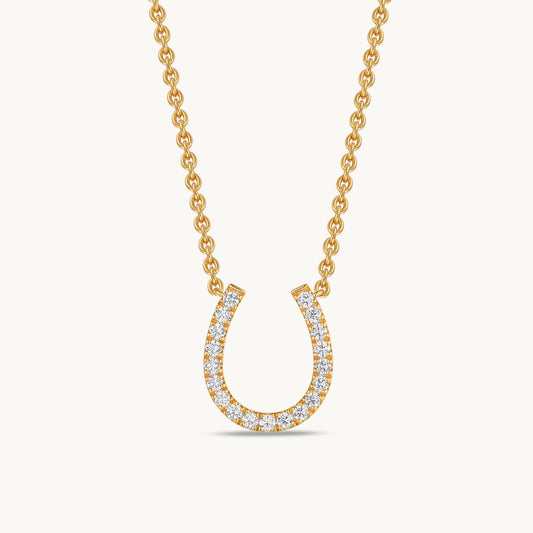 gold horseshoe charm necklace